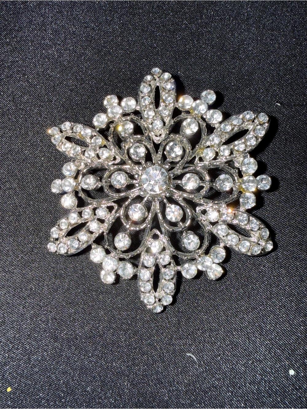 Source Unknown Silver and Clear Crystal Snowflake Brooch